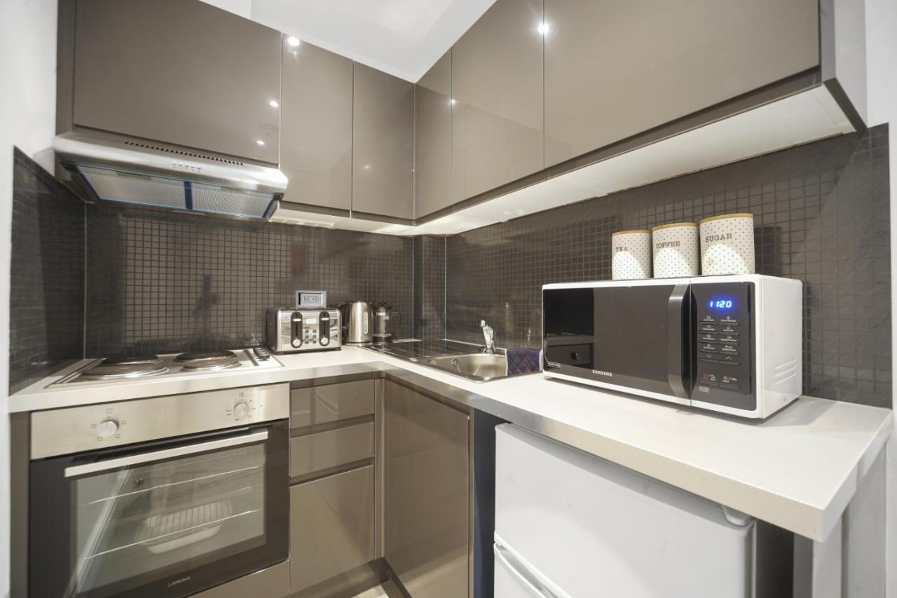 Studio Apartment By Homely Stays Londen Buitenkant foto